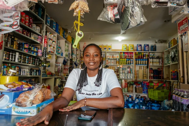 Small business owner behind a shop counter