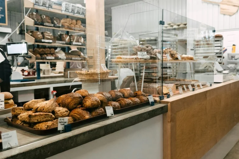 Bakery counter filled with fresh bread and pastries on display