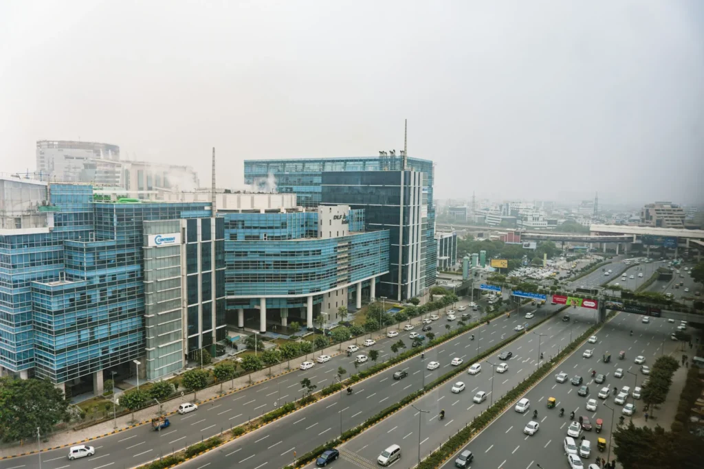 Glass office towers lining the expressway in Gurgaon's Cyber City business district