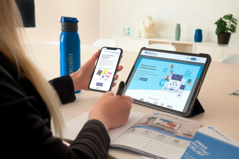 Phone and tablet showing a business website next to a printed brochure